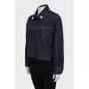 Denim jacket decorated with beads