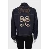 Denim jacket decorated with beads