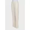 Straight white trousers with elastic