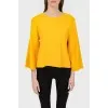 Jumper with shortened sleeves with cuts with a tag