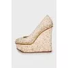 Wedge shoes decorated with sequins