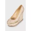 Wedge shoes decorated with sequins