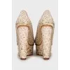 Wedge shoes decorated with sequins