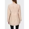 Jacket in a snake print with a tag