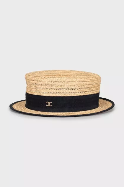 Straw hat with textile inserts