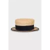 Straw hat with textile inserts