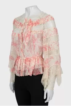 Button-down blouse decorated with lace