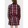 A jacket in an abstract checkered print with a tag