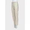 Beige eco-leather trousers