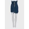 Denim skirt with button pockets