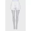 White shorts with ties
