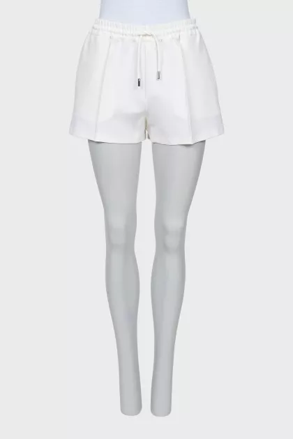White shorts with ties