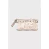 Clutch decorated with bows