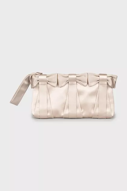 Clutch decorated with bows