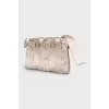 Clutch decorated with bows