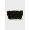 Bag decorated with black rhinestones