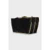 Bag decorated with black rhinestones