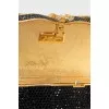 Bag decorated with black rhinestones