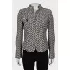 Vintage jacket decorated with a brooch