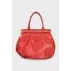 Orange snakeskin bag