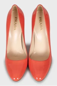 Orange patent leather shoes