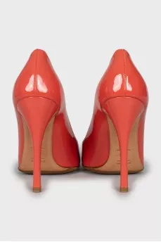 Orange patent leather shoes