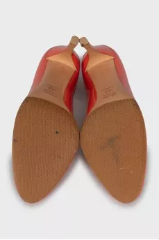 Orange patent leather shoes