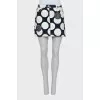 Mini skirt with branded patches