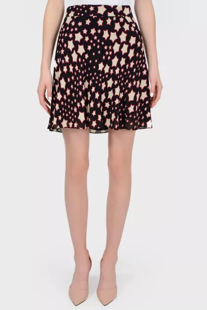 Skirt in the print of stars with tag