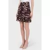Skirt in the print of stars with tag