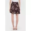 Skirt in the print of stars with tag