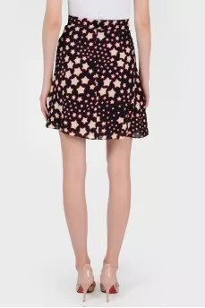 Skirt in the print of stars with tag