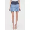 Denim skirt with a stake with tag