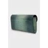 Green leather clutch