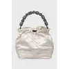 Bag with beaded handle