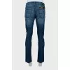 Men's distressed button down jeans