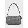 Leather bag with branded embossing