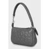 Leather bag with branded embossing