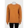 Orange sweatshirt
