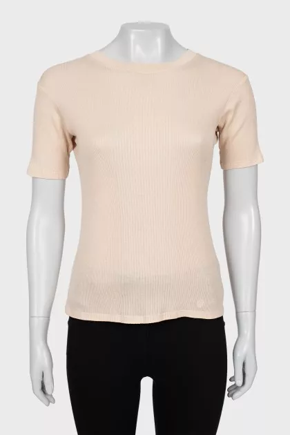 Tight fitting pink t-shirt