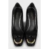 Leather shoes with trapezoid heels