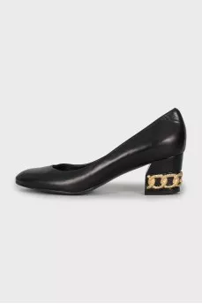 Leather shoes with decorated heels