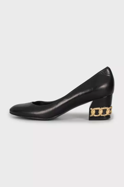 Leather shoes with decorated heels
