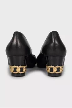 Leather shoes with decorated heels