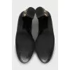 Leather shoes with decorated heels