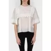 Blouse of a free cut with a tag