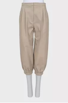 Cropped trousers with buttons