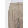 Cropped trousers with buttons