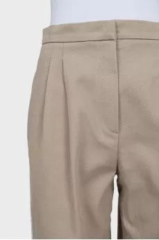 Cropped trousers with buttons
