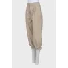 Cropped trousers with buttons